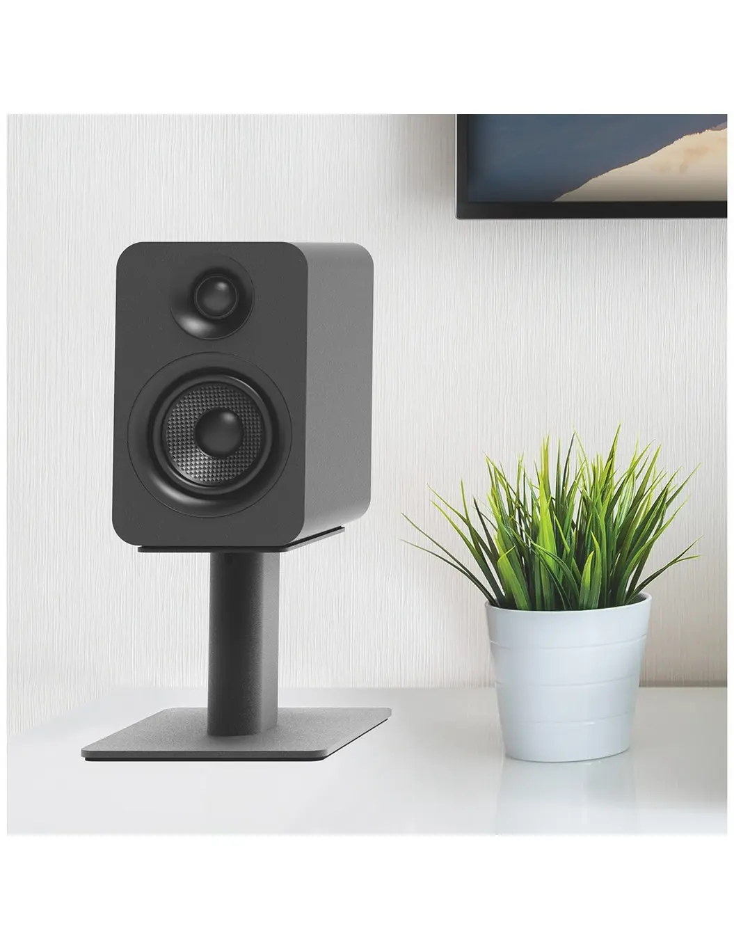 Kanto YUP4 visto de forma frontal, mostrando altavoces en detalle sobre soporte de mesa.